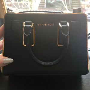 MK black leather w/ gold trim crossbody/clutch